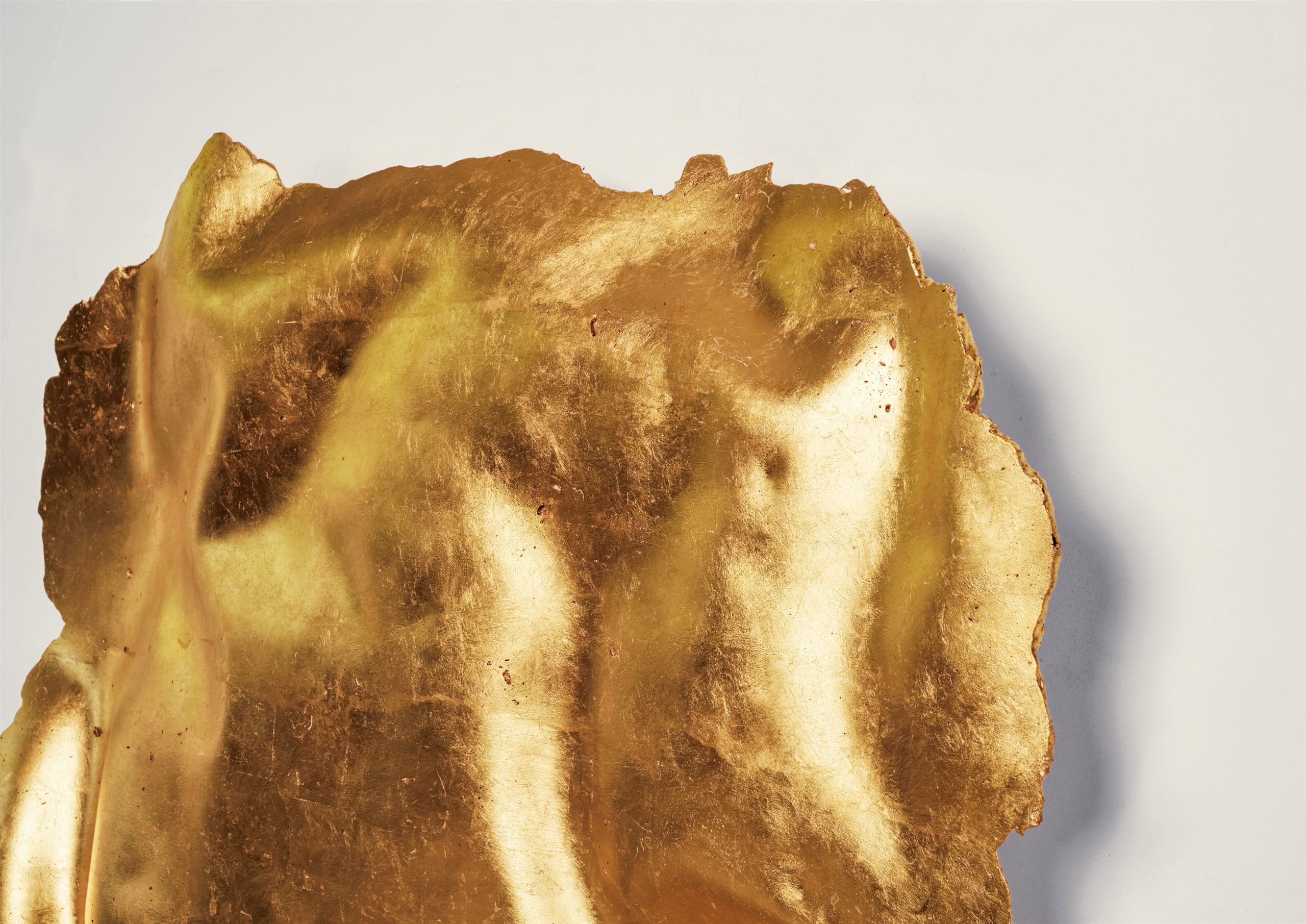 Golden Peel, 90x120x16cm, 2021, white cement, aluminum hydroxide, gilding, 23 Carat golden leaves